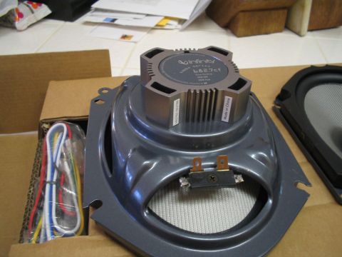 1993 Ford Probe - Infinity car speaker part with wiring harness and another speaker part in the background.
