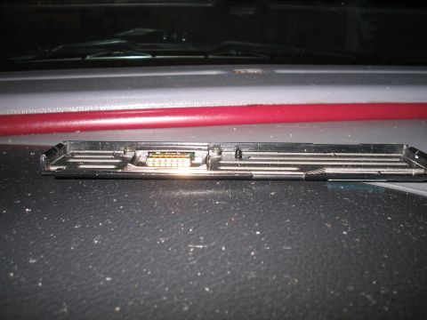 1993 Ford Probe - Interior car part with electrical connector visible.