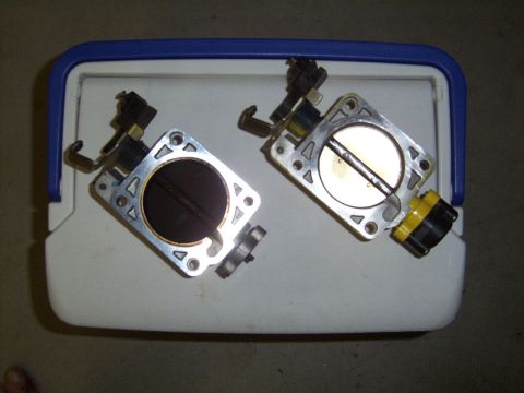 2002 Ford Mustang - New ported factory throttle body next to old