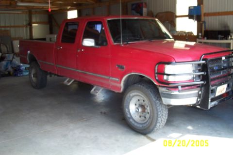 1995 Ford F-350 - This 1995 Ford F-350 crew cab pickup truck is parked inside a garage.