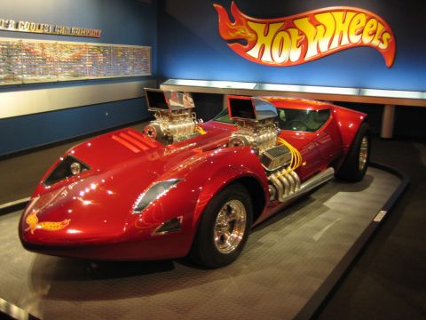 1968 Ford Mustang - This custom car, displayed at the Petersen Auto Museum, features a prominent Hot Wheels logo and dual superchargers.