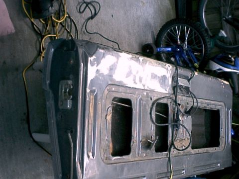 1990 Ford Bronco - Starting to prep the tailgate for Herculiner...What's this under the paint?