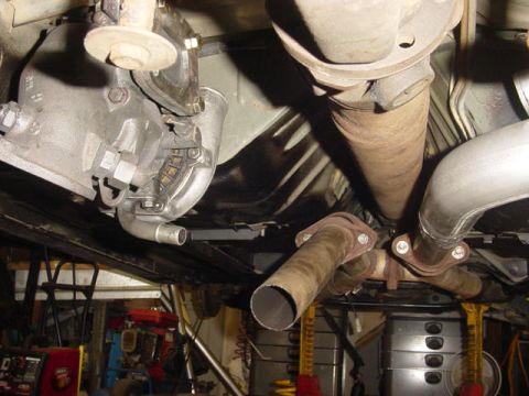 1995 Ford Mustang - Underside view of vehicle drivetrain components, including transmission, driveshaft, and exhaust system.