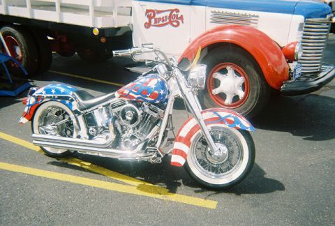 1972 Ford Ranchero - Motorcycle with patriotic paint scheme sits beside a vintage Pepsi-Cola delivery truck.