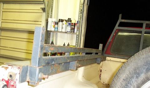 1990 Ford Bronco - These side rails fit in receivers and can be turned 90 degrees to run across the bed