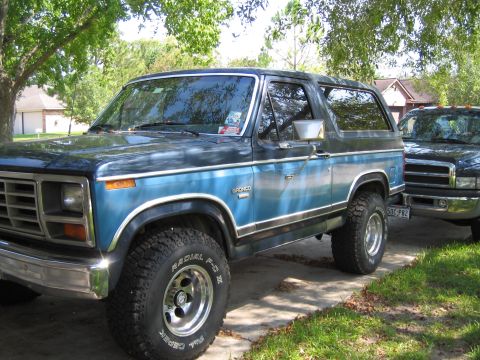 1982 Ford Bronco - This Ford Bronco has a two-tone paint scheme with a blue body and black top.
