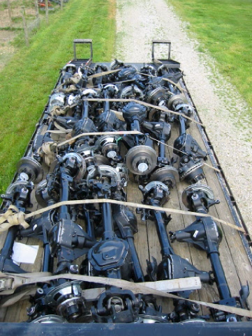 1994 Ford Bronco - Trailer full of rear axles. Supermotors.net logo is visible at the bottom right.