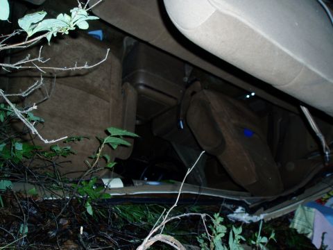 1989 Ford Bronco - ceiling crushed to the seats
