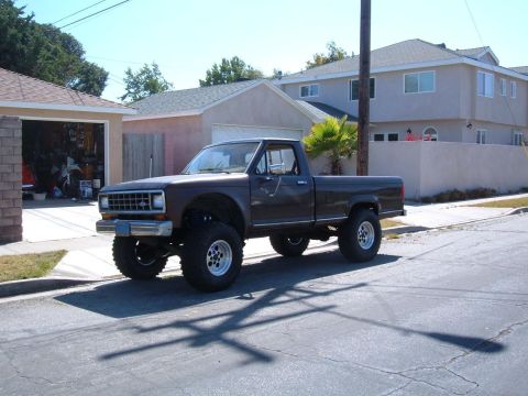 1985 Ford Ranger - This lifted 1985 Ford Ranger pickup truck is parked on a residential street.
