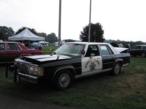 1991 Ford Crown Victoria - This 1991 Ford Crown Victoria is marked as a highway patrol vehicle and is seen at an outdoor event.