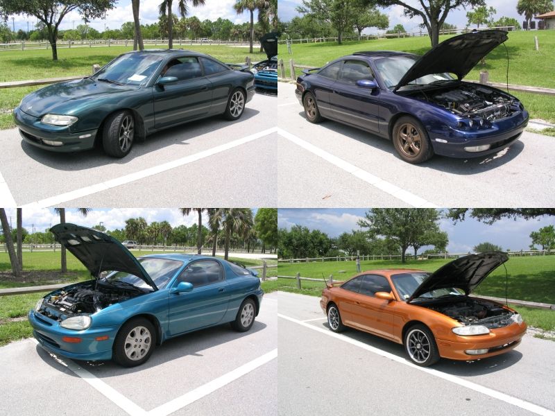 Four Mazda MX-3 cars in different colors, hoods open, parked in a lot