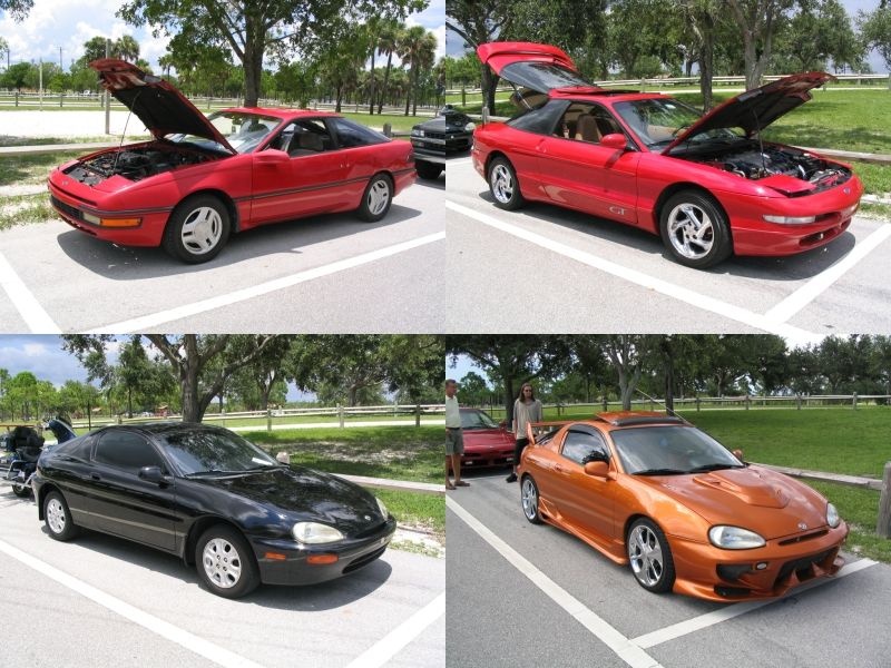 Red coupe with hood and trunk open, parked in a lot