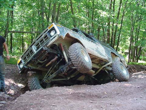 1979 Ford Bronco - This 1979 Ford Bronco is stuck in a ditch while off-roading through a wooded area.