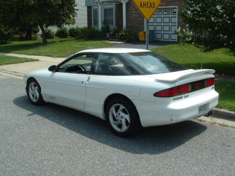 1996 Ford Probe - This 1996 Ford Probe GT is seen from the rear 3/4 angle, showing its distinctive spoiler and taillights.