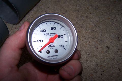 1997 Ford Probe - Pro-Comp Ultra-Lite oil pressure gauge reads 10 PSI.