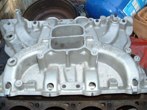 1978 Ford Bronco - Shot of 400 performer intake with injector bungs drilled out for installation of bung inserts
