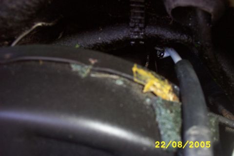 1983 Volkswagen Scirocco - A close-up view of a cable connection, possibly related to a broken cable issue.