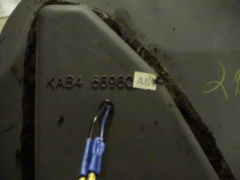 1997 Ford Probe - A part displays embossed serial numbers and a small label with the identifier A6.