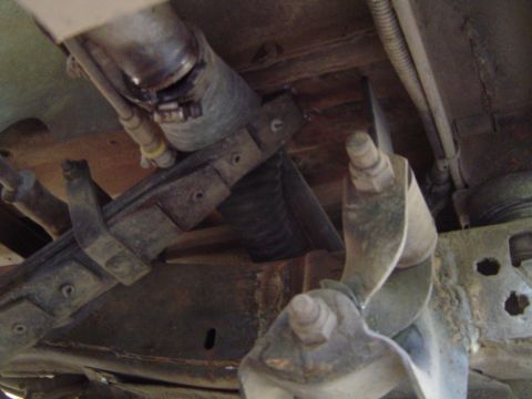 1967 Ford Bronco - Undercarriage view of vehicle suspension and exhaust system components. Supermotors.net logo is present.