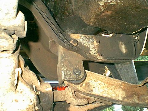 1983 Ford Bronco - Here is the back of the pass side (on drivers side) 4" drop mount. It is in the stock pivot mount and held in by 3 bolts.