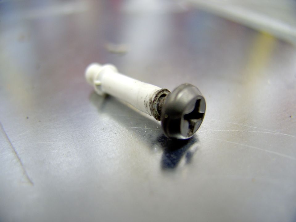 This is how you get the broken plastic vacuum line out of the angled rubber vacuum boot. Just screw in a sharp drywall stud screw and pull on it and out pops the broken plastic line. Then you can slip the boot over the shorter line, no vacuum leak !