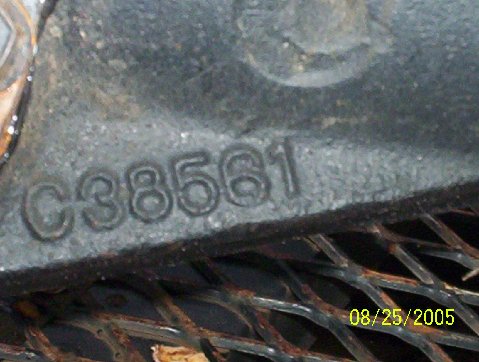 1989 Ford Bronco - A close-up view of a metal component shows the stamped casting number C38561.