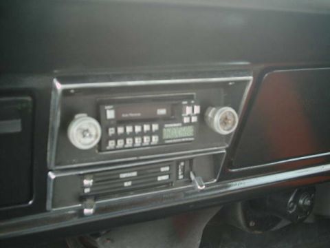1971 Ford F-100 - Interior view of a 1971 Ford F-100, focusing on the dashboard's radio and HVAC controls.