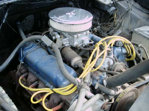 1971 Ford F-100 - Close-up of a Ford V8 engine, likely from a 1971 F-100, showing its drivetrain components.