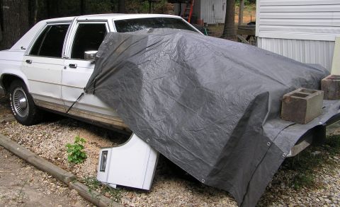 1986 Ford Crown Victoria LTD - covered for incoming rain