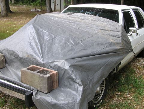1986 Ford Crown Victoria LTD - covered for incoming rain