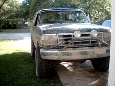 1992 Ford Bronco - Front view of a 1992 Ford Bronco, equipped with auxiliary lights on a grille guard.