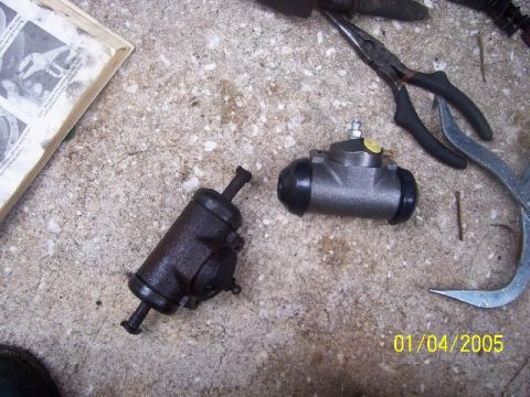 1987 Ford Bronco - The old and new cylinders side by side. Hard to beleive the old one is only two years old. The plungers have to be reused, the new cylinder…