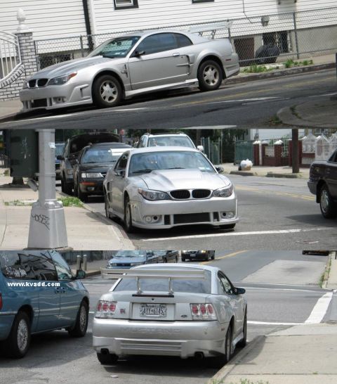 2000 Ford Crown Victoria - This silver coupe features a heavily modified body kit and a prominent rear spoiler, suggesting significant customization.