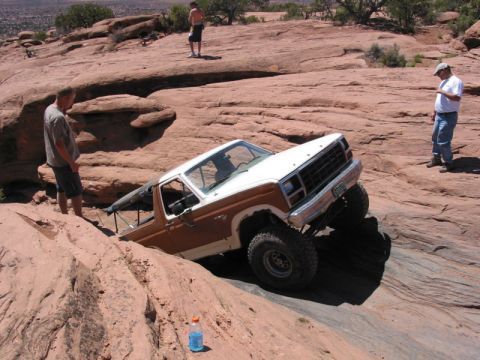 1981 Ford Bronco - This 1980 Ford Bronco navigates a challenging off-road course on a rocky, desert landscape.