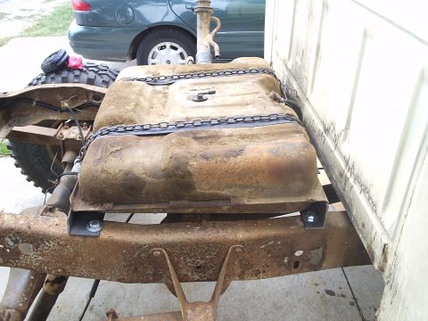 1979 Ford F-150 - Custom fuel tank relocation on a 1979 Ford F-150 chassis, showing the tank secured with chains.