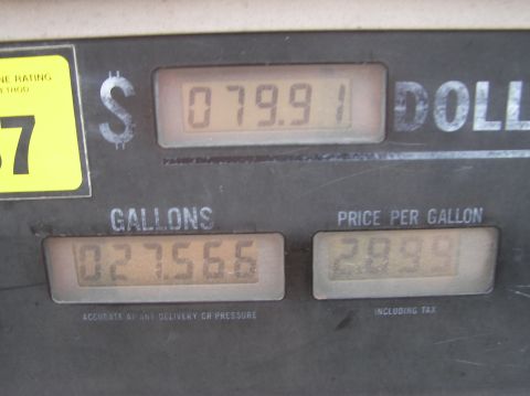 1986 Ford Bronco - A gas pump display shows the total cost, gallons dispensed, and price per gallon.