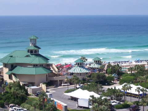 1995 Ford Bronco - A view of a beach resort complex with multiple buildings and the ocean in the background.