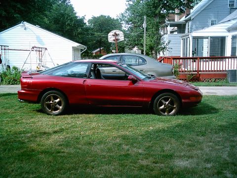 1993 Ford Probe - with bronze wheel paint and new muffler b4 the drop.