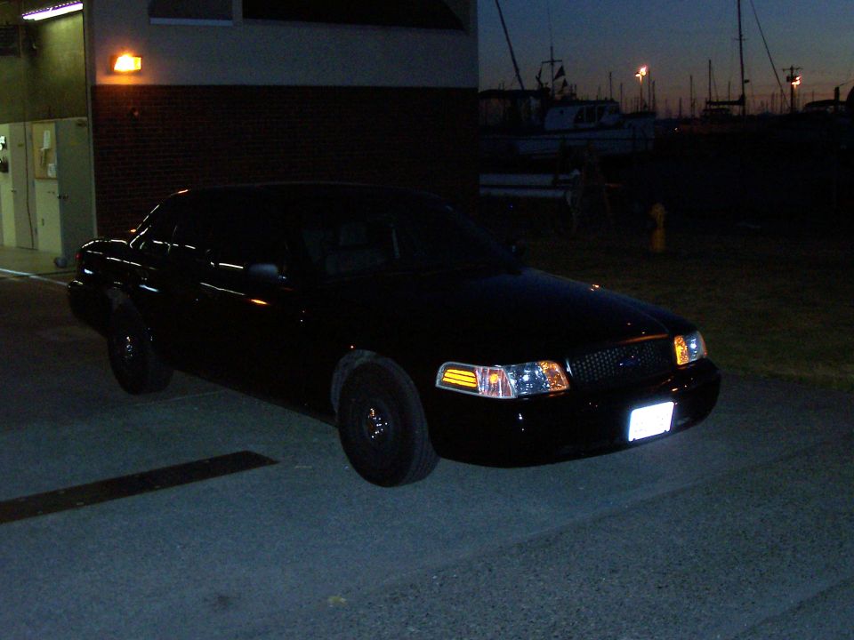Black 2003 Ford Crown Victoria 3q-front view