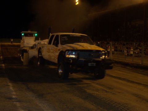 1994 Ford F-150 - A modified pickup truck is seen at night, possibly participating in a pull or drag event.
