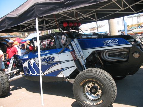 1986 Ford Bronco - Custom off-road buggy with prominent suspension components and branding.