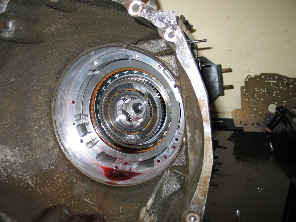 Close-up of transmission torque converter housing with internal components visible