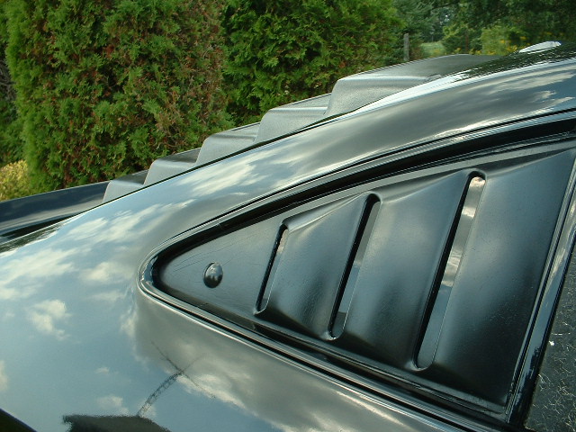1978 Ford Mustang II rear window louvers on black car