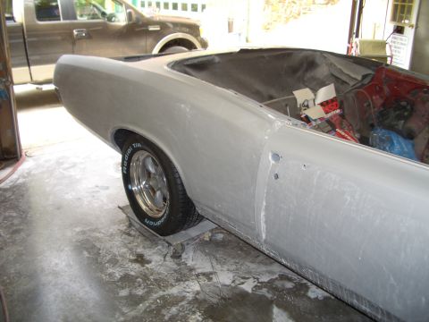1967 Pontiac GTO - A 1967 Pontiac GTO convertible is undergoing restoration, showing its bodywork and interior components.