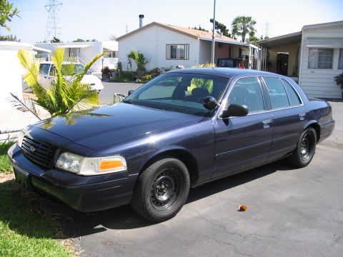 2000 Ford Crown Victoria - After driving it home from St Louis... Damn TX potholes ate two of my hubcaps.
