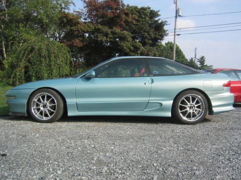 1993 Ford Probe - Side profile of a 1993 Ford Probe GT with custom wheels.