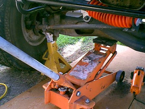 1983 Ford Bronco - this is what i do to hold the TTB as i did the swap. i put upward presure on the outside of the beam with a jack stand then pull the inside…