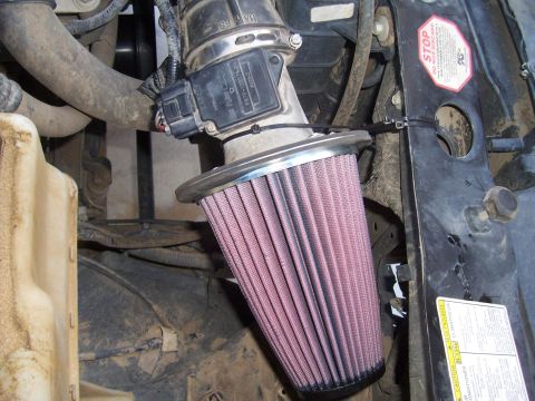 1998 Ford Ranger - Aftermarket cold air intake system installed in engine bay.