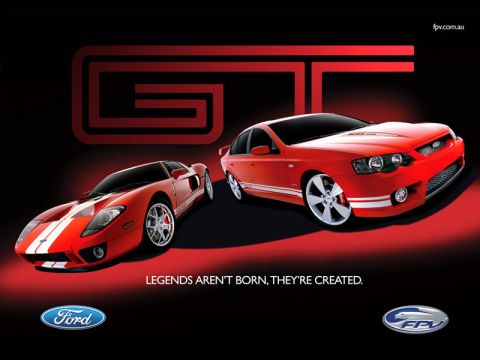1997 Ford Crown Victoria - Two red Ford performance cars are displayed with the "GT" logo and slogans.