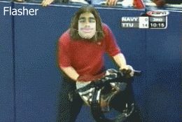 2000 Isuzu Rodeo - A person wearing a mask over their face is holding a motorcycle helmet in front of a blue wall.